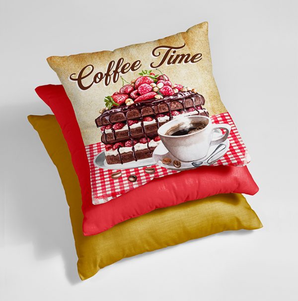 A stack of 3 cushions, one with coffee picture on cover.
