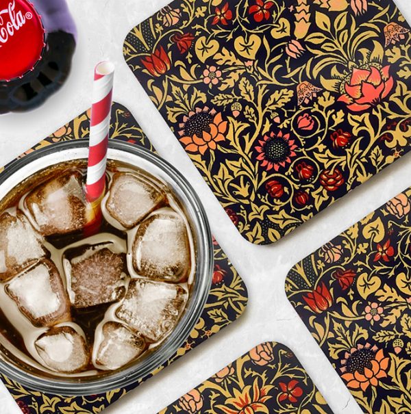 Drink coasters named Violet and Columbine with coke in glass on table